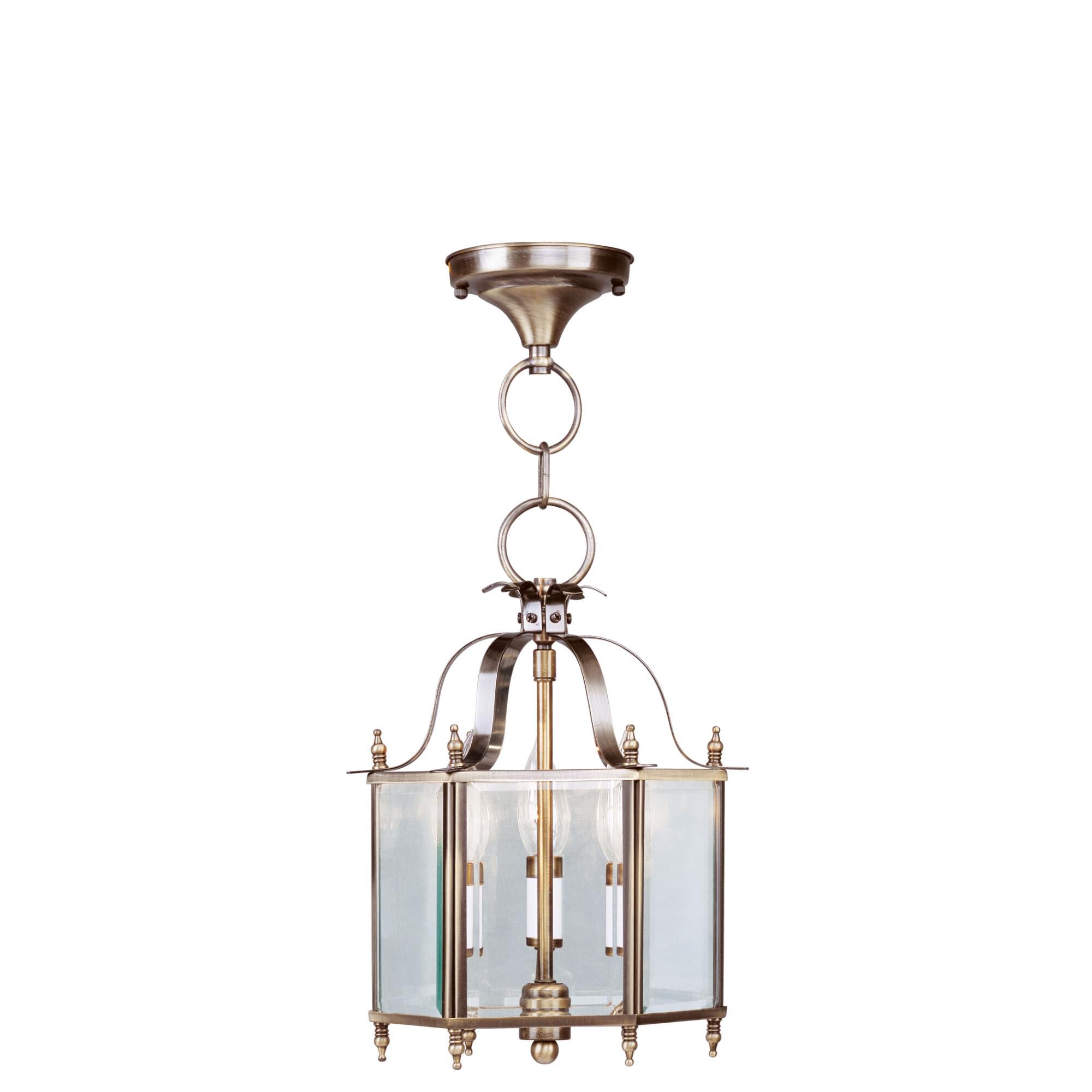 Shown in Antique Brass finish and Clear Beveled glass